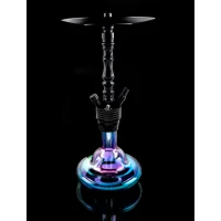 DSCHINNI PICO BLACK VENOM SHISHA - Wasserpfeife - Edelstahl Hybrid Shisha von DschinniDie Dschinni Pico Black Venom Shisha ist die neueste Edelstahl Hybrid Shisha aus dem Hause Dschinni.Technische Details:Höhe: ca. 43 cmDie Edelstahl Hybrid Shisha aus dem Hause Dschinni ist das Neuste und technisch aktuellste Modell aus dem neuen Sektor der Edelstahl Hybrid!Die Dschinni Pico Black Shisha ist der Nachfolger der weltberühmten Flexx Hybrid Reihe die den Shishamarkt ein komplett neues Gesicht gegeben hat. Die innovativen Systeme, wie das Klicksystem oder das Closed Chamber System waren Ihrer Zeit weit vorraus. Was ist das Upgrade dieser Shisha und was macht sie so besonderst?Als Flexx Junior hat diese Shisha ein großes Erbe, welches sie mit Design und dem neuen Fortschritt spielerisch übertrifft. Diese Shisha ist einfach genial, sie verbindet kompromisslose Qualität und mit einem unschlagbaren Preis. Das Innenskelett, und somit alle wichtigen funktionellen Teile die Korrosionsanfälligen Elemente bestehen aus Edelstahl und die optischen Elemente können ruhig aus Aluminium bestehen, weil diese nicht den Kontakt mit dem Rauch in diesem Umfang haben. Das ist eine enorme Aufwertung weil man im Grunde eine Edelstahlshisha besitzt zu einem unglaublichen Preis, ohne an Qualität einzubüßen.Die Shisha besteht aus eloxiertem Aluminiumummantelung während das Innenleben aus 304/4301 Stainless steel 18/8 besteht einer sehr hohen Form der Edelstahllegierung.Das Glas besteht aus High Borosilikatglas 3.3 dem hochwertigsten Glas auf dem Shishamarkt. Der Preis entscheidet nicht die Qualität sondern die Kriterien des Materiales selber. Und High Borosilikatglas 3.3 wird in der Weltraumforschung eingesetzt und in jeder Branche die sehr hohe Qualitätsansprüche besitzt. Die Vorteile von High Borosilikatglas 3.3 sprechen für sich. Es ist hygienisch, leicht zu reinigen und darüber hinaus noch umweltfreundlich. Es besitzt einen sehr hohen Härtegrad und ist sehr hitzebeständig, was es zum idealen Produkt im Laborbereich macht. Im Shishabereich bedeutet es für uns einfach das es robust ist und leicht zu reinigen, vorallem man kann es mit heissem Wasser auswaschen, wovor alle anderen Hersteller im Grunde warnen. Mit unseren Dschinni Shishas haben wir das Problem nicht eher im Gegenteil.Beim Aufbau wird die Rauchsäule und die Tauchrohre über ein Gewinde an die Base befestigt was schon die ganze Aufbaubeschreibung darstellt. Der Rest wird einfach aufgesteckt über Schliffsystem, somit stellt die Shisha keine Angriffsfläche für Verschleis da. Das Ausblasventil und der Schlauchadapter, welche beide mit einem 14.5 direkt in die Base gesteckt werden, die Schliffe machen die alten dichtungsringe überflüssig und legen sich geschmeidig in die entsprechenden Bohrungen. Der Auf und Abbau gestaltet sich leicht und schnell.Am Teller befindet sich ein 18.8 Schliff für den Teller, der zum Anbringen von Molassefängern dient und für anderen dekorativen Zubehörteile mit einem genormten 18.8 Schliff. Zudem kann bei entsprechendem Gebrauch der Teller nur abgenommen und transportiert werden, anstatt die ganze Shisha vom Platz zu bewegen, um z.B. den Kopf umzutauschen.Durch die Größe erreichen wir eine geringes Körpervolumen der Bowl was zu einer höhren Rauchdichte führt und das Ergebniss ist das erwünschte Rauchverhalten der Shisha, schön dichter großer Rauch. Durch die Form der Bowl erreichen wir einen sehr guten laminaren Strom der zu einem gigantischen guten Durchzug führt der aber nicht unangenehm ist. Das Tauchrohr besitzt keinen Diffusor, kann aber mit einem Silikondiffusor erweitert werden bei Gebrauch um die Geräuschkulisse beim Rauchen zu reduzieren.Das Closed Chamber System, welches aus dem Hause Dschinni stammt, verfügt in der Base 2 lotrechte Bohrungen die den turbulenten Strom laminar führen und das auspusten des abgestanden Rauches aus der Bowl ermöglicht.Die Base wird per Klickverschluss an die Bowl befestigt und somit lässt sich die Shisha extrem schnell und leicht auf und abbauen, was die Reinigung extrem erleichtert und beschleunigt.Die Shisha verbindet wunderschöne Optik mit dem neuesten technischen Update. _HINWEISEReinigung: Die Bowl kann man mit kochendem Wasser reinigen! Dies liegt an unserem High Borosilikatglas 3.3. Wir empfehlen einen Teelöffel Schmandweg in die Bowl zu tun und dies mit kochendem Wasser zu übergießen. Danach bitte kräftig schwenken und über Nacht ziehen lassen. Am nächsten Tag ordentlich durchspühlen und von Reststoffen befreien.Wir empfehlen die Shishas regelmäßig zu reinigen.12240Dschinni - Wasserpfeifen und Zubehör118,00 CHFsmoke-shop.ch118,00 CHF DSCHINNI PICO BLACK VENOM SHISHA - Wasserpfeife - Edelstahl Hybrid Shisha von DschinniDie Dschinni Pico Black Venom Shisha ist die neueste Edelstahl Hybrid Shisha aus dem Hause Dschinni.Technische Details:Höhe: ca. 43 cmDie Edelstahl Hybrid Shisha aus dem Hause Dschinni ist das Neuste und technisch aktuellste Modell aus dem neuen Sektor der Edelstahl Hybrid!Die Dschinni Pico Black Shisha ist der Nachfolger der weltberühmten Flexx Hybrid Reihe die den Shishamarkt ein komplett neues Gesicht gegeben hat. Die innovativen Systeme, wie das Klicksystem oder das Closed Chamber System waren Ihrer Zeit weit vorraus. Was ist das Upgrade dieser Shisha und was macht sie so besonderst?Als Flexx Junior hat diese Shisha ein großes Erbe, welches sie mit Design und dem neuen Fortschritt spielerisch übertrifft. Diese Shisha ist einfach genial, sie verbindet kompromisslose Qualität und mit einem unschlagbaren Preis. Das Innenskelett, und somit alle wichtigen funktionellen Teile die Korrosionsanfälligen Elemente bestehen aus Edelstahl und die optischen Elemente können ruhig aus Aluminium bestehen, weil diese nicht den Kontakt mit dem Rauch in diesem Umfang haben. Das ist eine enorme Aufwertung weil man im Grunde eine Edelstahlshisha besitzt zu einem unglaublichen Preis, ohne an Qualität einzubüßen.Die Shisha besteht aus eloxiertem Aluminiumummantelung während das Innenleben aus 304/4301 Stainless steel 18/8 besteht einer sehr hohen Form der Edelstahllegierung.Das Glas besteht aus High Borosilikatglas 3.3 dem hochwertigsten Glas auf dem Shishamarkt. Der Preis entscheidet nicht die Qualität sondern die Kriterien des Materiales selber. Und High Borosilikatglas 3.3 wird in der Weltraumforschung eingesetzt und in jeder Branche die sehr hohe Qualitätsansprüche besitzt. Die Vorteile von High Borosilikatglas 3.3 sprechen für sich. Es ist hygienisch, leicht zu reinigen und darüber hinaus noch umweltfreundlich. Es besitzt einen sehr hohen Härtegrad und ist sehr hitzebeständig, was es zum idealen Produkt im Laborbereich macht. Im Shishabereich bedeutet es für uns einfach das es robust ist und leicht zu reinigen, vorallem man kann es mit heissem Wasser auswaschen, wovor alle anderen Hersteller im Grunde warnen. Mit unseren Dschinni Shishas haben wir das Problem nicht eher im Gegenteil.Beim Aufbau wird die Rauchsäule und die Tauchrohre über ein Gewinde an die Base befestigt was schon die ganze Aufbaubeschreibung darstellt. Der Rest wird einfach aufgesteckt über Schliffsystem, somit stellt die Shisha keine Angriffsfläche für Verschleis da. Das Ausblasventil und der Schlauchadapter, welche beide mit einem 14.5 direkt in die Base gesteckt werden, die Schliffe machen die alten dichtungsringe überflüssig und legen sich geschmeidig in die entsprechenden Bohrungen. Der Auf und Abbau gestaltet sich leicht und schnell.Am Teller befindet sich ein 18.8 Schliff für den Teller, der zum Anbringen von Molassefängern dient und für anderen dekorativen Zubehörteile mit einem genormten 18.8 Schliff. Zudem kann bei entsprechendem Gebrauch der Teller nur abgenommen und transportiert werden, anstatt die ganze Shisha vom Platz zu bewegen, um z.B. den Kopf umzutauschen.Durch die Größe erreichen wir eine geringes Körpervolumen der Bowl was zu einer höhren Rauchdichte führt und das Ergebniss ist das erwünschte Rauchverhalten der Shisha, schön dichter großer Rauch. Durch die Form der Bowl erreichen wir einen sehr guten laminaren Strom der zu einem gigantischen guten Durchzug führt der aber nicht unangenehm ist. Das Tauchrohr besitzt keinen Diffusor, kann aber mit einem Silikondiffusor erweitert werden bei Gebrauch um die Geräuschkulisse beim Rauchen zu reduzieren.Das Closed Chamber System, welches aus dem Hause Dschinni stammt, verfügt in der Base 2 lotrechte Bohrungen die den turbulenten Strom laminar führen und das auspusten des abgestanden Rauches aus der Bowl ermöglicht.Die Base wird per Klickverschluss an die Bowl befestigt und somit lässt sich die Shisha extrem schnell und leicht auf und abbauen, was die Reinigung extrem erleichtert und beschleunigt.Die Shisha verbindet wunderschöne Optik mit dem neuesten technischen Update. _HINWEISEReinigung: Die Bowl kann man mit kochendem Wasser reinigen! Dies liegt an unserem High Borosilikatglas 3.3. Wir empfehlen einen Teelöffel Schmandweg in die Bowl zu tun und dies mit kochendem Wasser zu übergießen. Danach bitte kräftig schwenken und über Nacht ziehen lassen. Am nächsten Tag ordentlich durchspühlen und von Reststoffen befreien.Wir empfehlen die Shishas regelmäßig zu reinigen.12240Dschinni - Wasserpfeifen und Zubehör118,00 CHFsmoke-shop.ch118,00 CHF