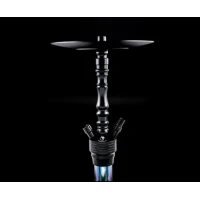 DSCHINNI PICO BLACK VENOM SHISHA - Wasserpfeife - Edelstahl Hybrid Shisha von DschinniDie Dschinni Pico Black Venom Shisha ist die neueste Edelstahl Hybrid Shisha aus dem Hause Dschinni.Technische Details:Höhe: ca. 43 cmDie Edelstahl Hybrid Shisha aus dem Hause Dschinni ist das Neuste und technisch aktuellste Modell aus dem neuen Sektor der Edelstahl Hybrid!Die Dschinni Pico Black Shisha ist der Nachfolger der weltberühmten Flexx Hybrid Reihe die den Shishamarkt ein komplett neues Gesicht gegeben hat. Die innovativen Systeme, wie das Klicksystem oder das Closed Chamber System waren Ihrer Zeit weit vorraus. Was ist das Upgrade dieser Shisha und was macht sie so besonderst?Als Flexx Junior hat diese Shisha ein großes Erbe, welches sie mit Design und dem neuen Fortschritt spielerisch übertrifft. Diese Shisha ist einfach genial, sie verbindet kompromisslose Qualität und mit einem unschlagbaren Preis. Das Innenskelett, und somit alle wichtigen funktionellen Teile die Korrosionsanfälligen Elemente bestehen aus Edelstahl und die optischen Elemente können ruhig aus Aluminium bestehen, weil diese nicht den Kontakt mit dem Rauch in diesem Umfang haben. Das ist eine enorme Aufwertung weil man im Grunde eine Edelstahlshisha besitzt zu einem unglaublichen Preis, ohne an Qualität einzubüßen.Die Shisha besteht aus eloxiertem Aluminiumummantelung während das Innenleben aus 304/4301 Stainless steel 18/8 besteht einer sehr hohen Form der Edelstahllegierung.Das Glas besteht aus High Borosilikatglas 3.3 dem hochwertigsten Glas auf dem Shishamarkt. Der Preis entscheidet nicht die Qualität sondern die Kriterien des Materiales selber. Und High Borosilikatglas 3.3 wird in der Weltraumforschung eingesetzt und in jeder Branche die sehr hohe Qualitätsansprüche besitzt. Die Vorteile von High Borosilikatglas 3.3 sprechen für sich. Es ist hygienisch, leicht zu reinigen und darüber hinaus noch umweltfreundlich. Es besitzt einen sehr hohen Härtegrad und ist sehr hitzebeständig, was es zum idealen Produkt im Laborbereich macht. Im Shishabereich bedeutet es für uns einfach das es robust ist und leicht zu reinigen, vorallem man kann es mit heissem Wasser auswaschen, wovor alle anderen Hersteller im Grunde warnen. Mit unseren Dschinni Shishas haben wir das Problem nicht eher im Gegenteil.Beim Aufbau wird die Rauchsäule und die Tauchrohre über ein Gewinde an die Base befestigt was schon die ganze Aufbaubeschreibung darstellt. Der Rest wird einfach aufgesteckt über Schliffsystem, somit stellt die Shisha keine Angriffsfläche für Verschleis da. Das Ausblasventil und der Schlauchadapter, welche beide mit einem 14.5 direkt in die Base gesteckt werden, die Schliffe machen die alten dichtungsringe überflüssig und legen sich geschmeidig in die entsprechenden Bohrungen. Der Auf und Abbau gestaltet sich leicht und schnell.Am Teller befindet sich ein 18.8 Schliff für den Teller, der zum Anbringen von Molassefängern dient und für anderen dekorativen Zubehörteile mit einem genormten 18.8 Schliff. Zudem kann bei entsprechendem Gebrauch der Teller nur abgenommen und transportiert werden, anstatt die ganze Shisha vom Platz zu bewegen, um z.B. den Kopf umzutauschen.Durch die Größe erreichen wir eine geringes Körpervolumen der Bowl was zu einer höhren Rauchdichte führt und das Ergebniss ist das erwünschte Rauchverhalten der Shisha, schön dichter großer Rauch. Durch die Form der Bowl erreichen wir einen sehr guten laminaren Strom der zu einem gigantischen guten Durchzug führt der aber nicht unangenehm ist. Das Tauchrohr besitzt keinen Diffusor, kann aber mit einem Silikondiffusor erweitert werden bei Gebrauch um die Geräuschkulisse beim Rauchen zu reduzieren.Das Closed Chamber System, welches aus dem Hause Dschinni stammt, verfügt in der Base 2 lotrechte Bohrungen die den turbulenten Strom laminar führen und das auspusten des abgestanden Rauches aus der Bowl ermöglicht.Die Base wird per Klickverschluss an die Bowl befestigt und somit lässt sich die Shisha extrem schnell und leicht auf und abbauen, was die Reinigung extrem erleichtert und beschleunigt.Die Shisha verbindet wunderschöne Optik mit dem neuesten technischen Update. _HINWEISEReinigung: Die Bowl kann man mit kochendem Wasser reinigen! Dies liegt an unserem High Borosilikatglas 3.3. Wir empfehlen einen Teelöffel Schmandweg in die Bowl zu tun und dies mit kochendem Wasser zu übergießen. Danach bitte kräftig schwenken und über Nacht ziehen lassen. Am nächsten Tag ordentlich durchspühlen und von Reststoffen befreien.Wir empfehlen die Shishas regelmäßig zu reinigen.12240Dschinni - Wasserpfeifen und Zubehör118,00 CHFsmoke-shop.ch118,00 CHF DSCHINNI PICO BLACK VENOM SHISHA - Wasserpfeife - Edelstahl Hybrid Shisha von DschinniDie Dschinni Pico Black Venom Shisha ist die neueste Edelstahl Hybrid Shisha aus dem Hause Dschinni.Technische Details:Höhe: ca. 43 cmDie Edelstahl Hybrid Shisha aus dem Hause Dschinni ist das Neuste und technisch aktuellste Modell aus dem neuen Sektor der Edelstahl Hybrid!Die Dschinni Pico Black Shisha ist der Nachfolger der weltberühmten Flexx Hybrid Reihe die den Shishamarkt ein komplett neues Gesicht gegeben hat. Die innovativen Systeme, wie das Klicksystem oder das Closed Chamber System waren Ihrer Zeit weit vorraus. Was ist das Upgrade dieser Shisha und was macht sie so besonderst?Als Flexx Junior hat diese Shisha ein großes Erbe, welches sie mit Design und dem neuen Fortschritt spielerisch übertrifft. Diese Shisha ist einfach genial, sie verbindet kompromisslose Qualität und mit einem unschlagbaren Preis. Das Innenskelett, und somit alle wichtigen funktionellen Teile die Korrosionsanfälligen Elemente bestehen aus Edelstahl und die optischen Elemente können ruhig aus Aluminium bestehen, weil diese nicht den Kontakt mit dem Rauch in diesem Umfang haben. Das ist eine enorme Aufwertung weil man im Grunde eine Edelstahlshisha besitzt zu einem unglaublichen Preis, ohne an Qualität einzubüßen.Die Shisha besteht aus eloxiertem Aluminiumummantelung während das Innenleben aus 304/4301 Stainless steel 18/8 besteht einer sehr hohen Form der Edelstahllegierung.Das Glas besteht aus High Borosilikatglas 3.3 dem hochwertigsten Glas auf dem Shishamarkt. Der Preis entscheidet nicht die Qualität sondern die Kriterien des Materiales selber. Und High Borosilikatglas 3.3 wird in der Weltraumforschung eingesetzt und in jeder Branche die sehr hohe Qualitätsansprüche besitzt. Die Vorteile von High Borosilikatglas 3.3 sprechen für sich. Es ist hygienisch, leicht zu reinigen und darüber hinaus noch umweltfreundlich. Es besitzt einen sehr hohen Härtegrad und ist sehr hitzebeständig, was es zum idealen Produkt im Laborbereich macht. Im Shishabereich bedeutet es für uns einfach das es robust ist und leicht zu reinigen, vorallem man kann es mit heissem Wasser auswaschen, wovor alle anderen Hersteller im Grunde warnen. Mit unseren Dschinni Shishas haben wir das Problem nicht eher im Gegenteil.Beim Aufbau wird die Rauchsäule und die Tauchrohre über ein Gewinde an die Base befestigt was schon die ganze Aufbaubeschreibung darstellt. Der Rest wird einfach aufgesteckt über Schliffsystem, somit stellt die Shisha keine Angriffsfläche für Verschleis da. Das Ausblasventil und der Schlauchadapter, welche beide mit einem 14.5 direkt in die Base gesteckt werden, die Schliffe machen die alten dichtungsringe überflüssig und legen sich geschmeidig in die entsprechenden Bohrungen. Der Auf und Abbau gestaltet sich leicht und schnell.Am Teller befindet sich ein 18.8 Schliff für den Teller, der zum Anbringen von Molassefängern dient und für anderen dekorativen Zubehörteile mit einem genormten 18.8 Schliff. Zudem kann bei entsprechendem Gebrauch der Teller nur abgenommen und transportiert werden, anstatt die ganze Shisha vom Platz zu bewegen, um z.B. den Kopf umzutauschen.Durch die Größe erreichen wir eine geringes Körpervolumen der Bowl was zu einer höhren Rauchdichte führt und das Ergebniss ist das erwünschte Rauchverhalten der Shisha, schön dichter großer Rauch. Durch die Form der Bowl erreichen wir einen sehr guten laminaren Strom der zu einem gigantischen guten Durchzug führt der aber nicht unangenehm ist. Das Tauchrohr besitzt keinen Diffusor, kann aber mit einem Silikondiffusor erweitert werden bei Gebrauch um die Geräuschkulisse beim Rauchen zu reduzieren.Das Closed Chamber System, welches aus dem Hause Dschinni stammt, verfügt in der Base 2 lotrechte Bohrungen die den turbulenten Strom laminar führen und das auspusten des abgestanden Rauches aus der Bowl ermöglicht.Die Base wird per Klickverschluss an die Bowl befestigt und somit lässt sich die Shisha extrem schnell und leicht auf und abbauen, was die Reinigung extrem erleichtert und beschleunigt.Die Shisha verbindet wunderschöne Optik mit dem neuesten technischen Update. _HINWEISEReinigung: Die Bowl kann man mit kochendem Wasser reinigen! Dies liegt an unserem High Borosilikatglas 3.3. Wir empfehlen einen Teelöffel Schmandweg in die Bowl zu tun und dies mit kochendem Wasser zu übergießen. Danach bitte kräftig schwenken und über Nacht ziehen lassen. Am nächsten Tag ordentlich durchspühlen und von Reststoffen befreien.Wir empfehlen die Shishas regelmäßig zu reinigen.12240Dschinni - Wasserpfeifen und Zubehör118,00 CHFsmoke-shop.ch118,00 CHF