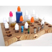 Dampfständer für 28 Liquids + 9 Drip Tips LiquidbarLieferumfang: 1x Liquidbar &amp; moreDer praktische Helfer wurde spezielle für ihre Liquids entwickelt.    Diese Variante ist mit 3 cm Höhe und 28 cm Breite und auch sehr platzsparend. Ideal zu verwenden für Ihren Wohnbereich wie z.b Wohnzimmer,Büro,Küche u.s.w Maße: B 28 cm /H 3 cm/ T 20 cm Lochmaße : 16 x 2,2 cm/ 9 x 1 cm/ 4 x 2,5 cm /4 x 3,5 cm / 4 x 4,0 cm4014Smoke-Shop.ch23,90 CHFsmoke-shop.ch23,90 CHF